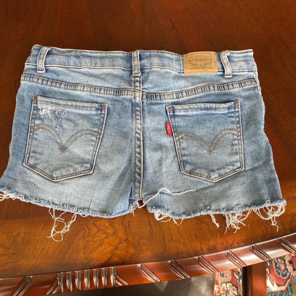 Levi’s girls jean shorts (self distressed)